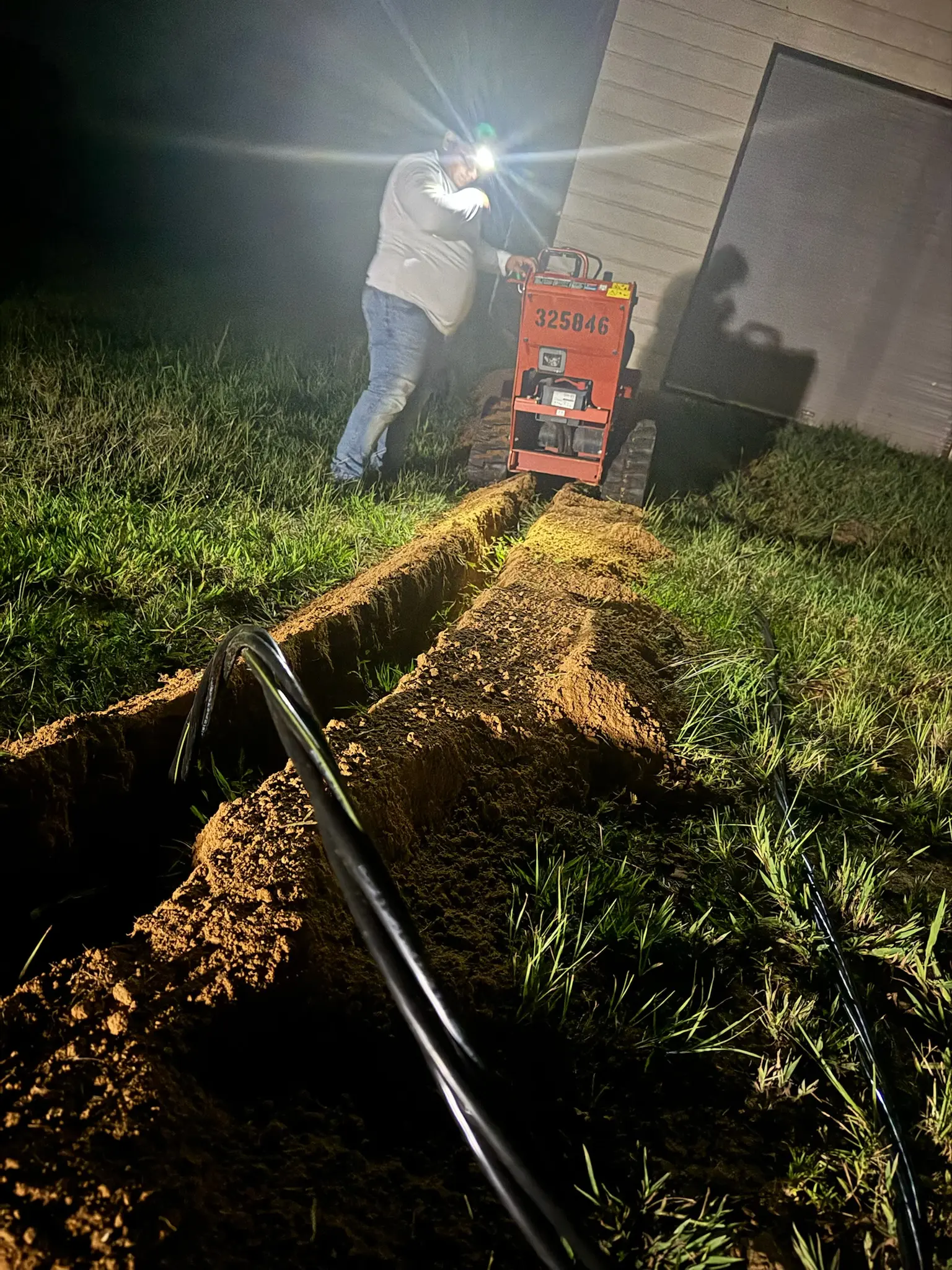 Trenching for a new underground electrical service by Chosen 1 Electric
