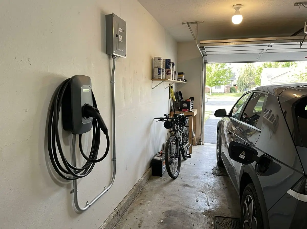 Level 2 EV charger and sub-panel installed in a Houston garage by Chosen 1 Electric